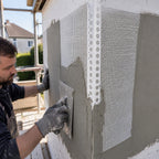70x70mm PVC mesh render corner bead being installed on an external wall with a plasterer applying render