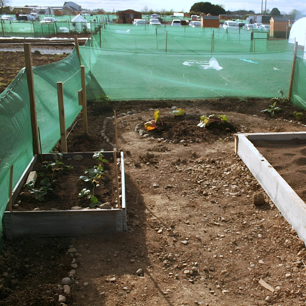 110gsm Green HDPE Wind Barrier Mesh with 50% Shade & 40% Airflow Reduction – UV Stabilised with 5cm Eyelets
