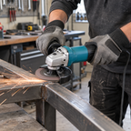 Close-up of a 1200W variable speed angle grinder cutting steel with sparks in a workshop