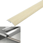 Beige threshold ramp with metal track and measurements on a white background
