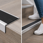 A13 40mm anodised aluminium threshold close-up showing a clean transition between timber-effect flooring and stone tile