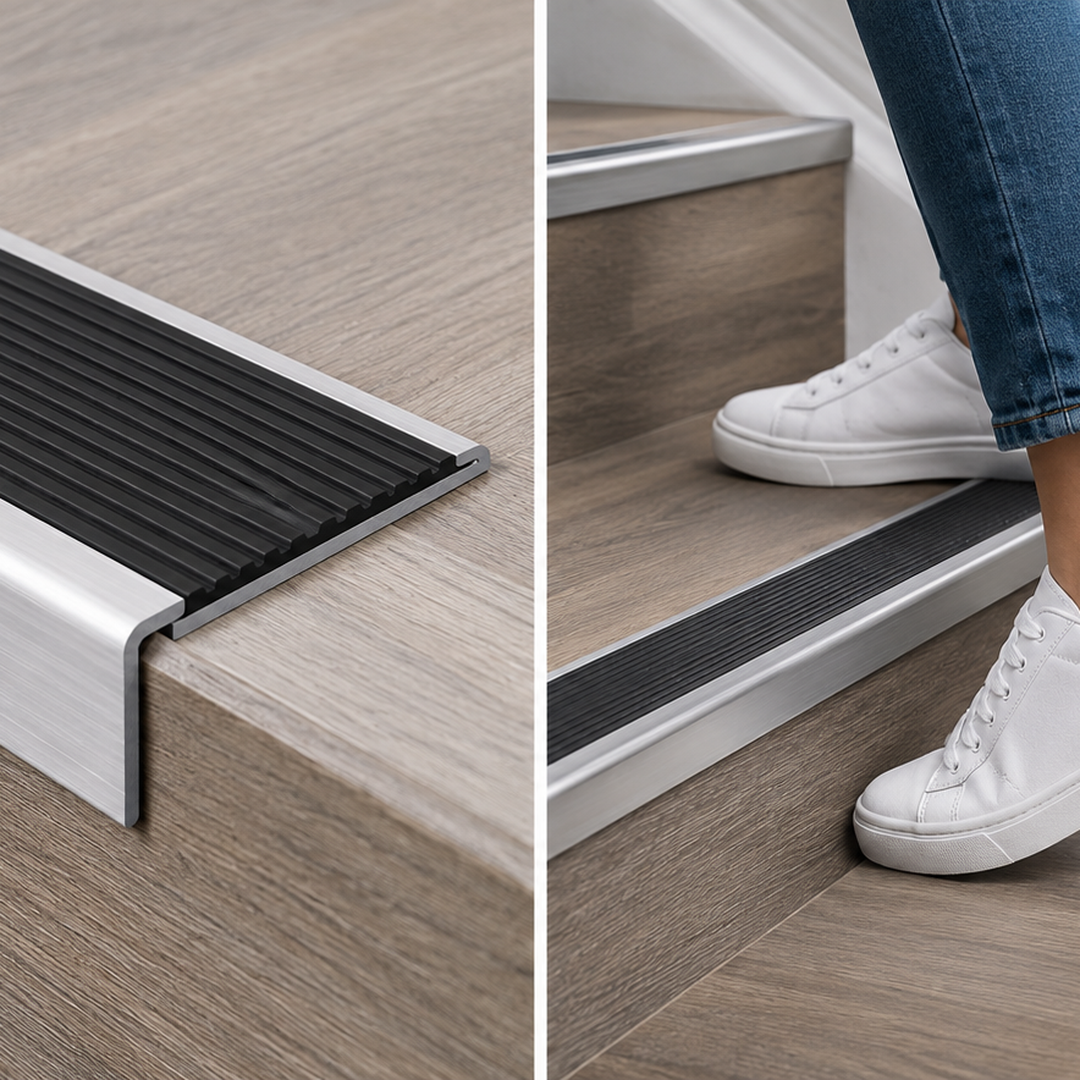 A13 40mm anodised aluminium threshold close-up showing a clean transition between timber-effect flooring and stone tile