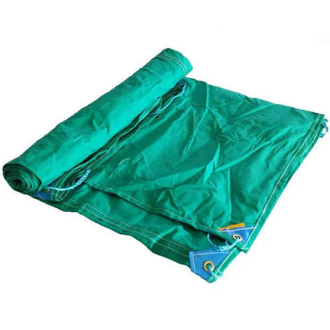 Rolled-up green tarp with blue corners on a white background