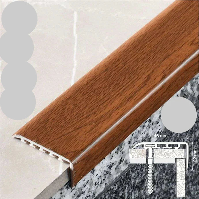 Wooden floor trim with UPVC label on a neutral background