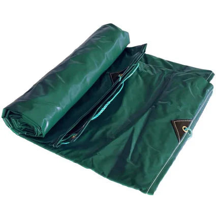 Green tarp rolled up on a white background