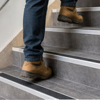 63mm NHD06 aluminium stair edge with Tredsafe anti-slip insert installed on tiled stairs