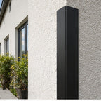 Black 70x70mm PVC corner angle trim protecting an exposed building corner