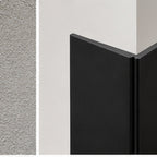 Black 70x70mm PVC corner angle trim installed on an interior wall corner