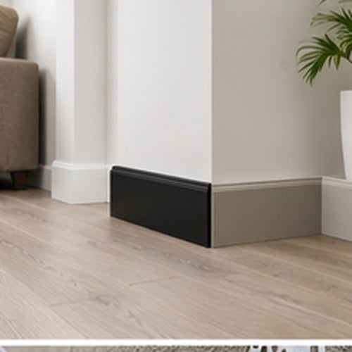 80mm PVC skirting board installed along a modern interior wall and wood-effect floor