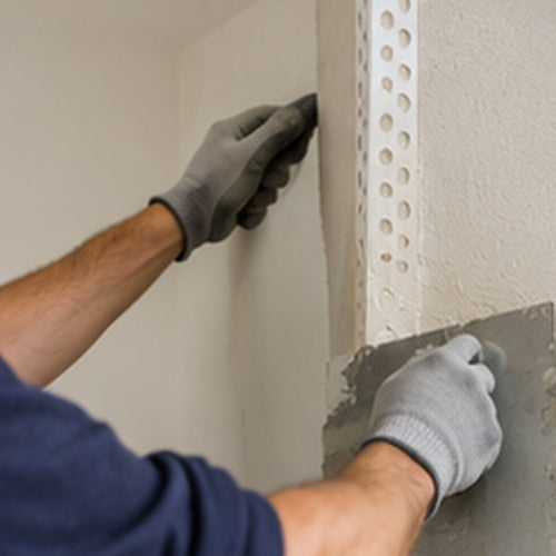 23x23mm PVC universal render corner bead being installed by a plasterer